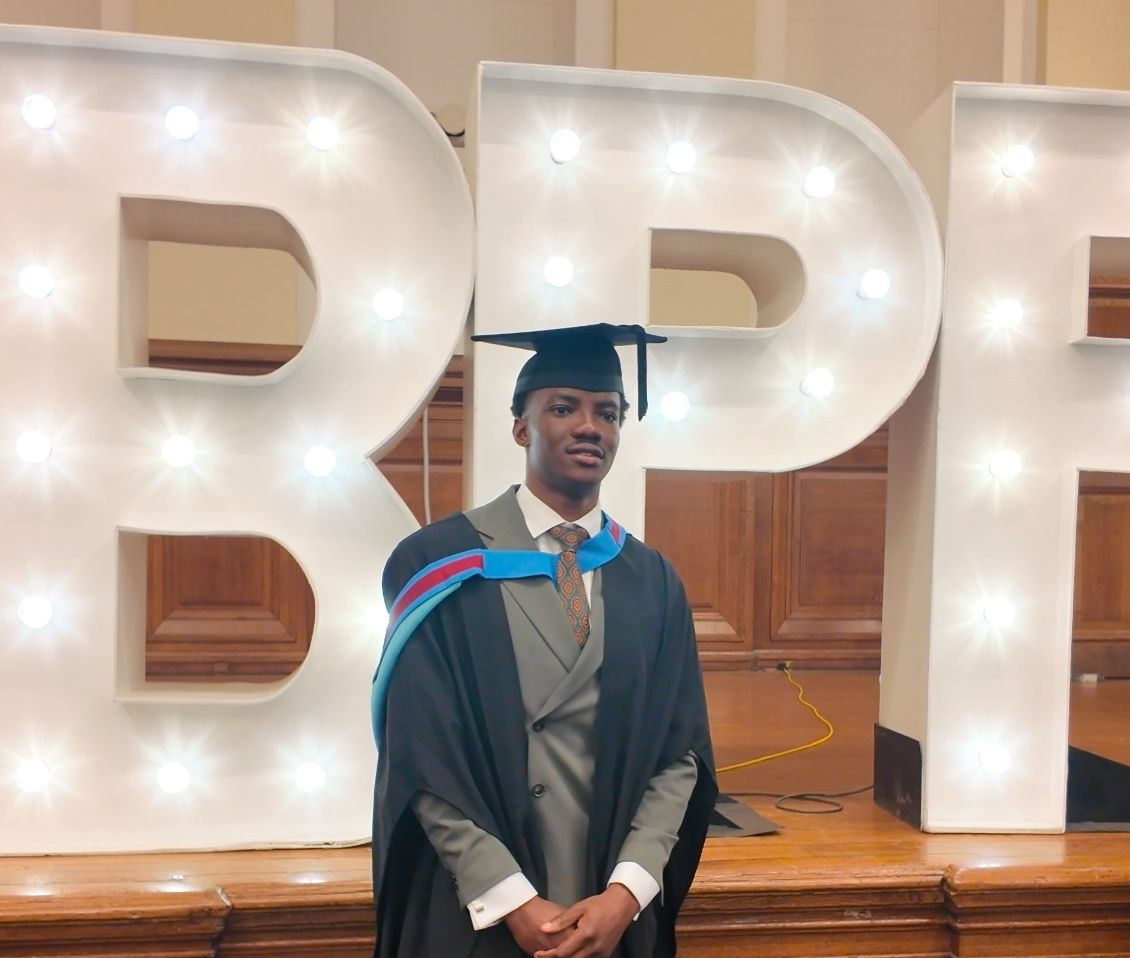 Iyioluwa Adesan at his degree apprenticeship graduation